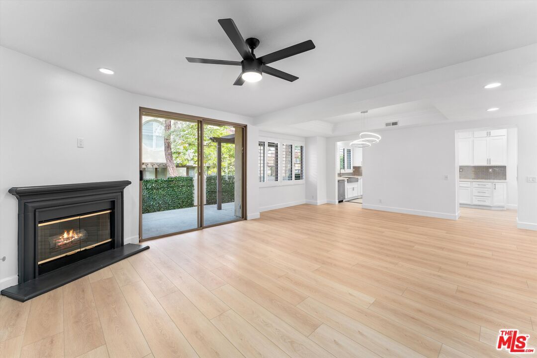 Empty room, Fireplace, Interior, Pendant Lights, Recessed Lighting, Wood Texture Flooring