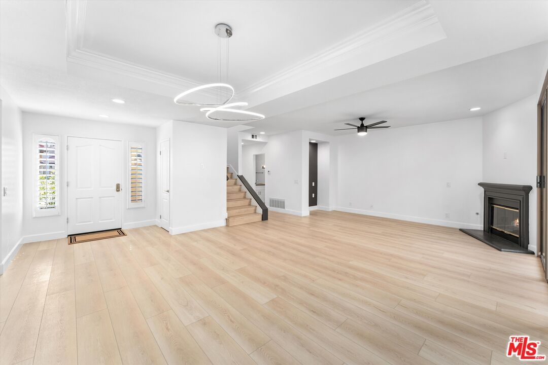 Empty room, Fireplace, Interior, Pendant Lights, Recessed Lighting, Wood Texture Flooring