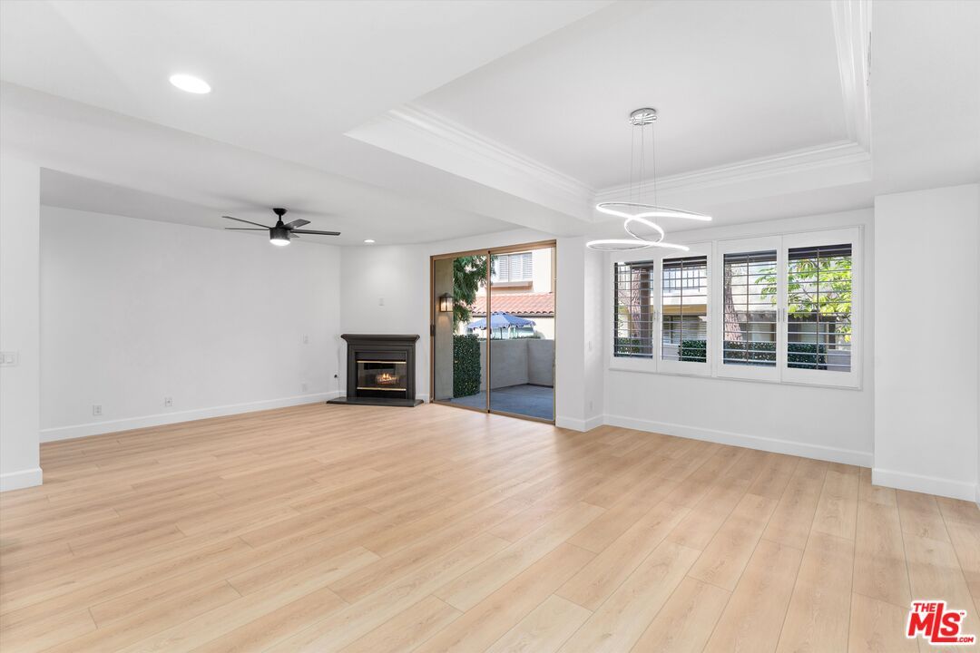 Empty room, Fireplace, Interior, Pendant Lights, Recessed Lighting, Wood Texture Flooring