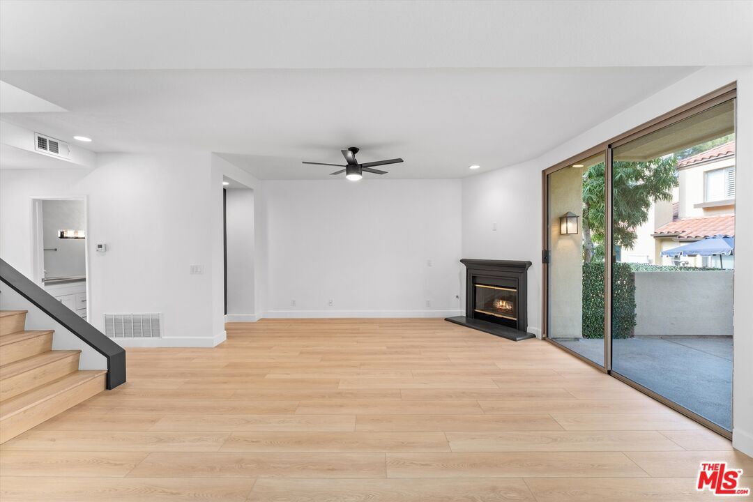 Empty room, Fireplace, Interior, Recessed Lighting, Wood Texture Flooring
