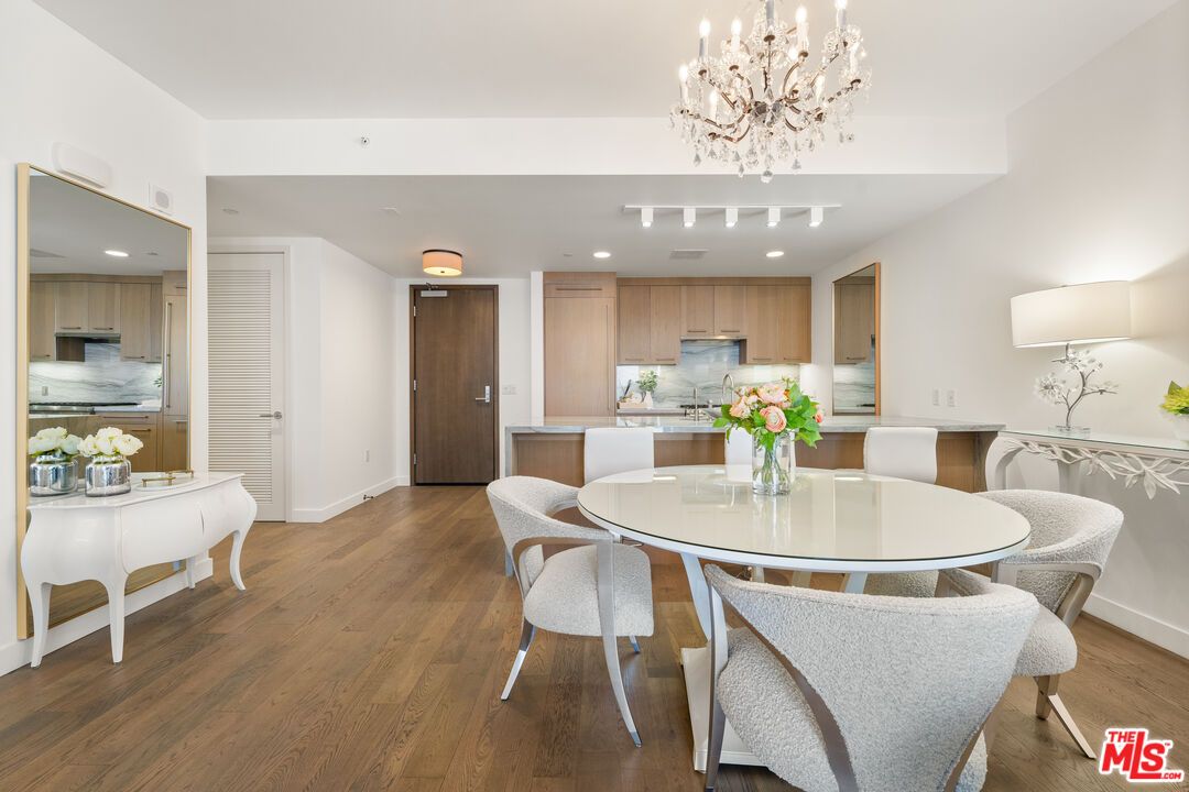 Chandelier, Dining room, Interior, Kitchen, Recessed Lighting, Stainless Steel Appliances, Wood Texture Flooring