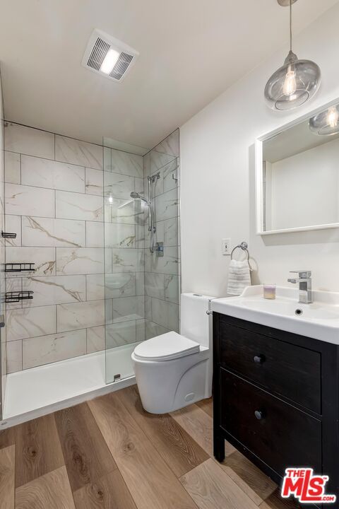Bathroom, Glass Shower, Interior, Marble Walls, Pendant Lights, Wood Texture Flooring