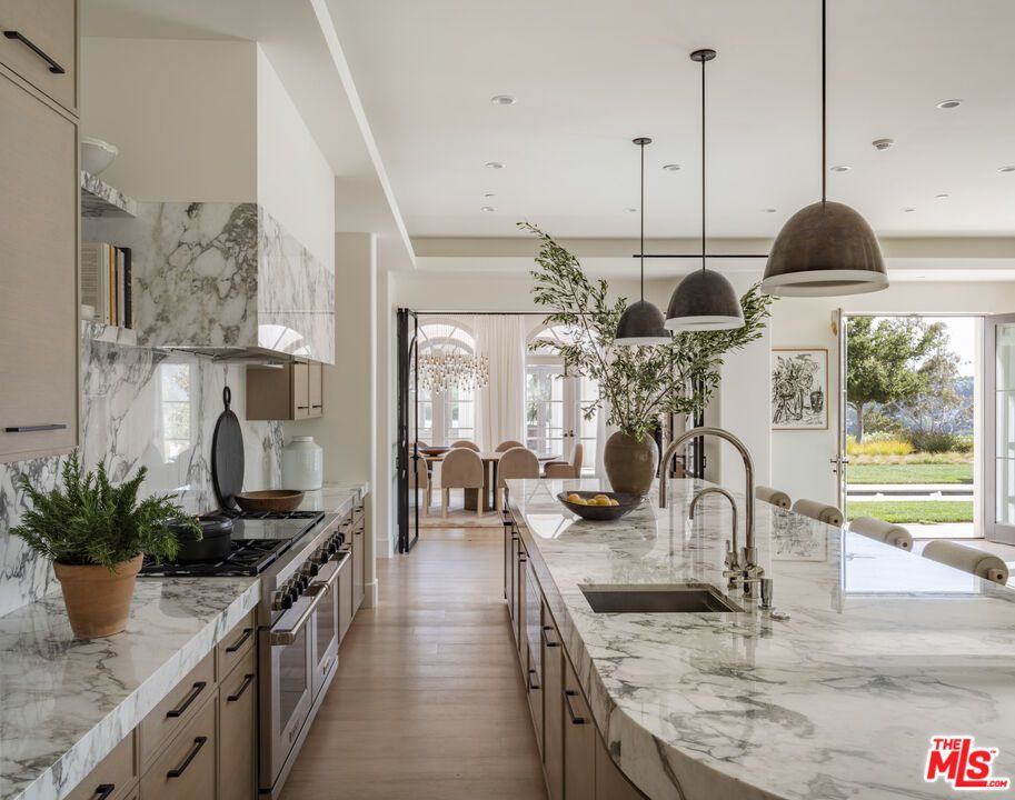 Interior, Kitchen, Marble Walls, Pendant Lights, Recessed Lighting, Wood Texture Flooring