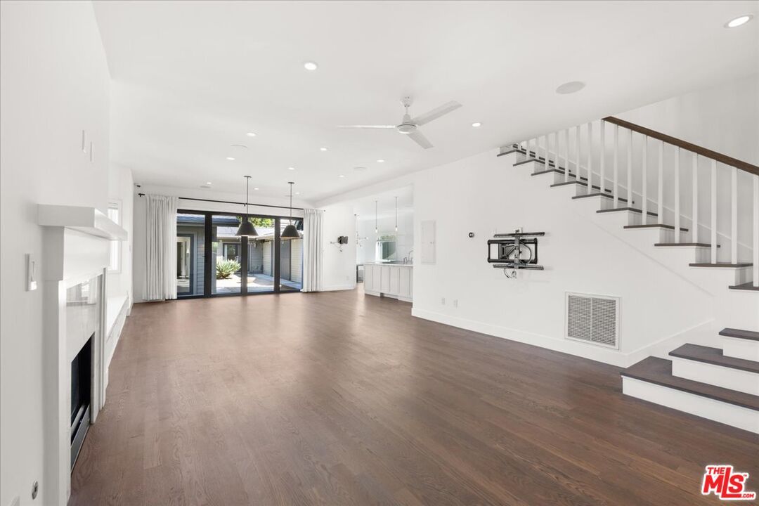 Empty room, Fireplace, Interior, Pendant Lights, Recessed Lighting, Wood Texture Flooring