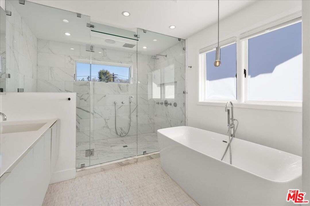 Bathroom, Free Standing Baths, Glass Shower, Interior, Marble Walls, Pendant Lights, Recessed Lighting