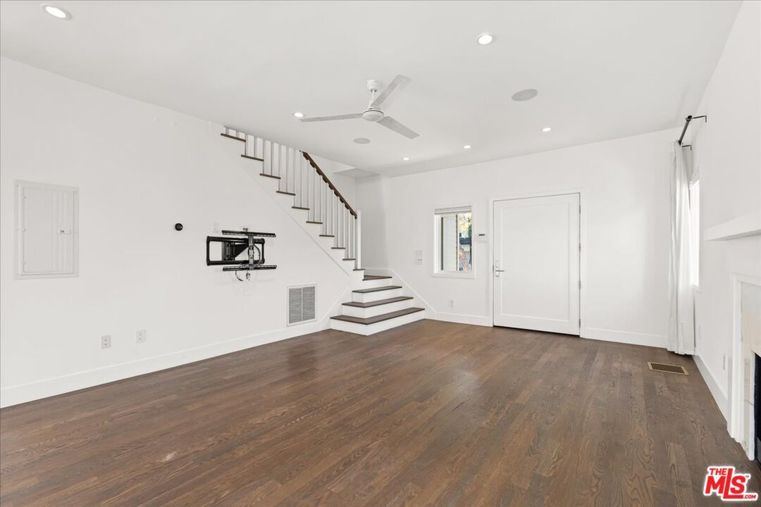 Empty room, Fireplace, Interior, Recessed Lighting, Wood Texture Flooring