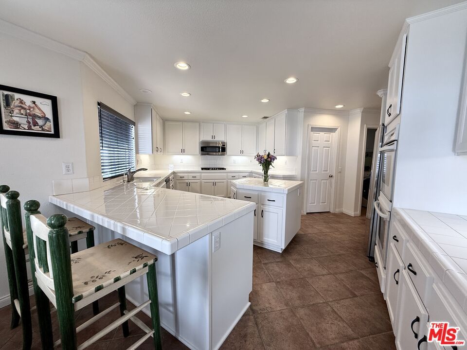 Interior, Kitchen, Recessed Lighting, Tile Countertops