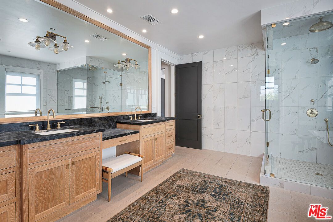 Bathroom, Dual Sink Vanities, Glass Shower, Interior, Marble Walls, Recessed Lighting
