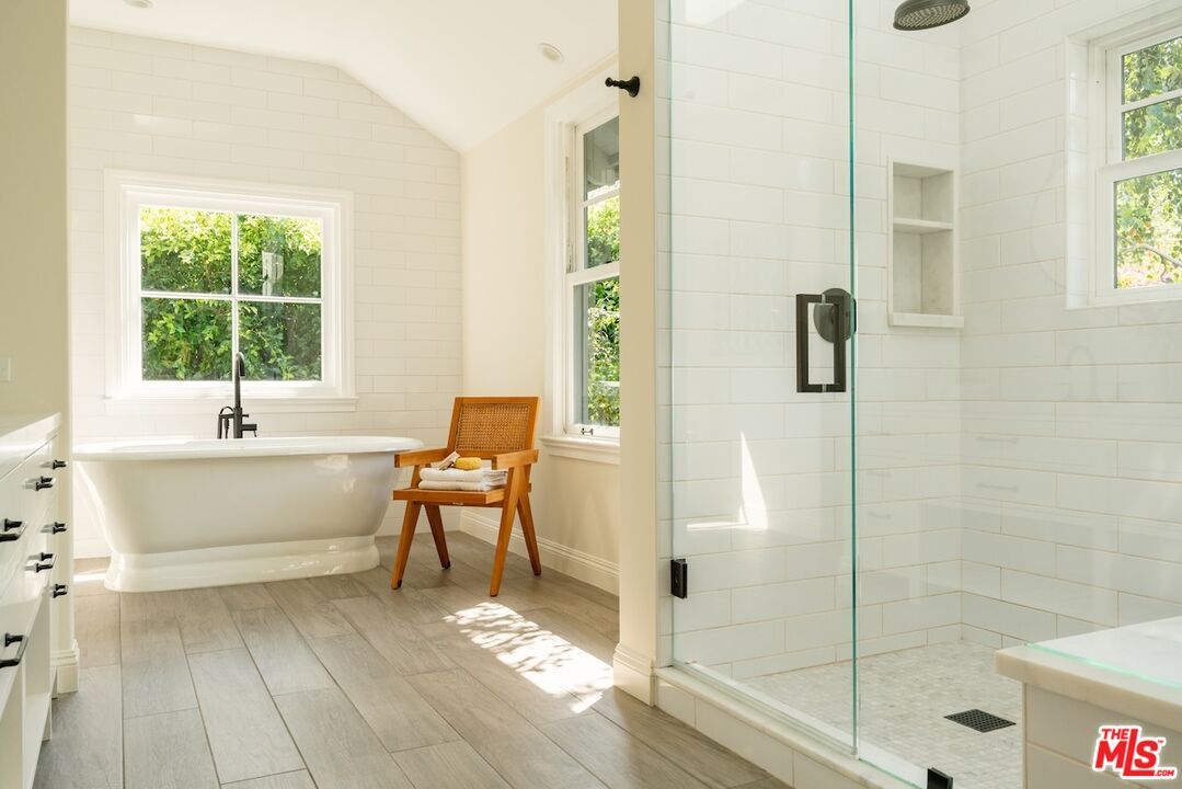 Bathroom, Free Standing Baths, Glass Shower, Interior, Recessed Lighting, Wood Texture Flooring