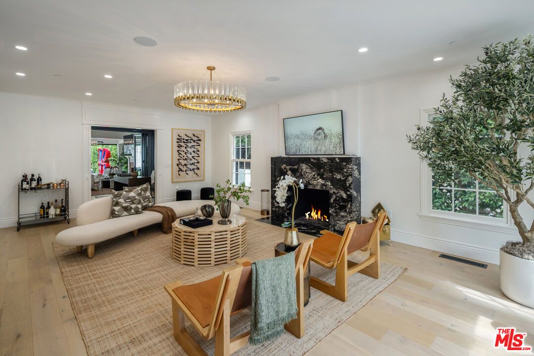 Chandelier, Fireplace, Interior, Living room, Recessed Lighting, Wood Texture Flooring