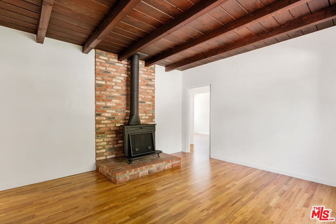 Empty room, Fireplace, Interior, Stone Walls, Wooden Beams, Wooden Ceilings, Wood Texture Flooring