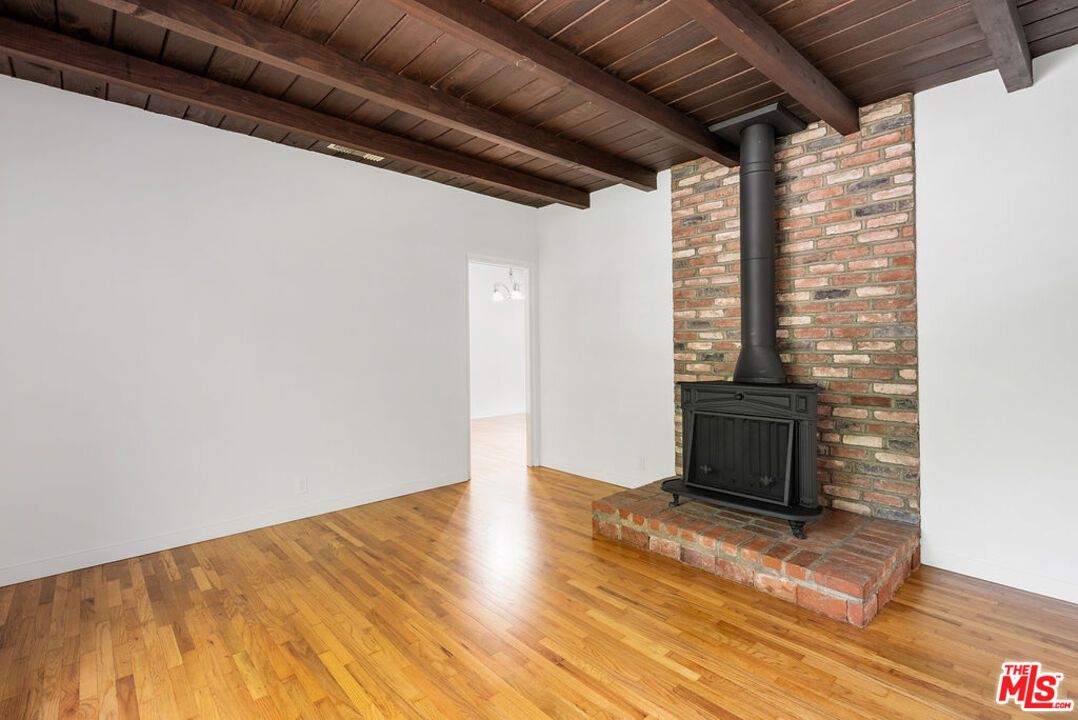 Empty room, Fireplace, Interior, Stone Walls, Wooden Beams, Wooden Ceilings, Wood Texture Flooring