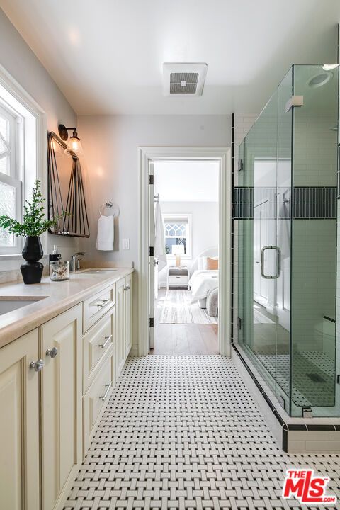 Bathroom, Bedroom, Dual Sink Vanities, Glass Shower, Interior, Recessed Lighting, Wood Texture Flooring