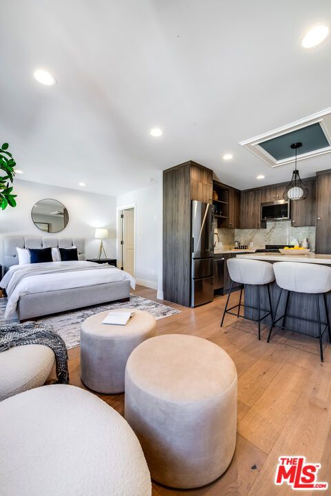 Bedroom, Interior, Kitchen, Living room, Recessed Lighting, Stainless Steel Appliances, Wood Texture Flooring