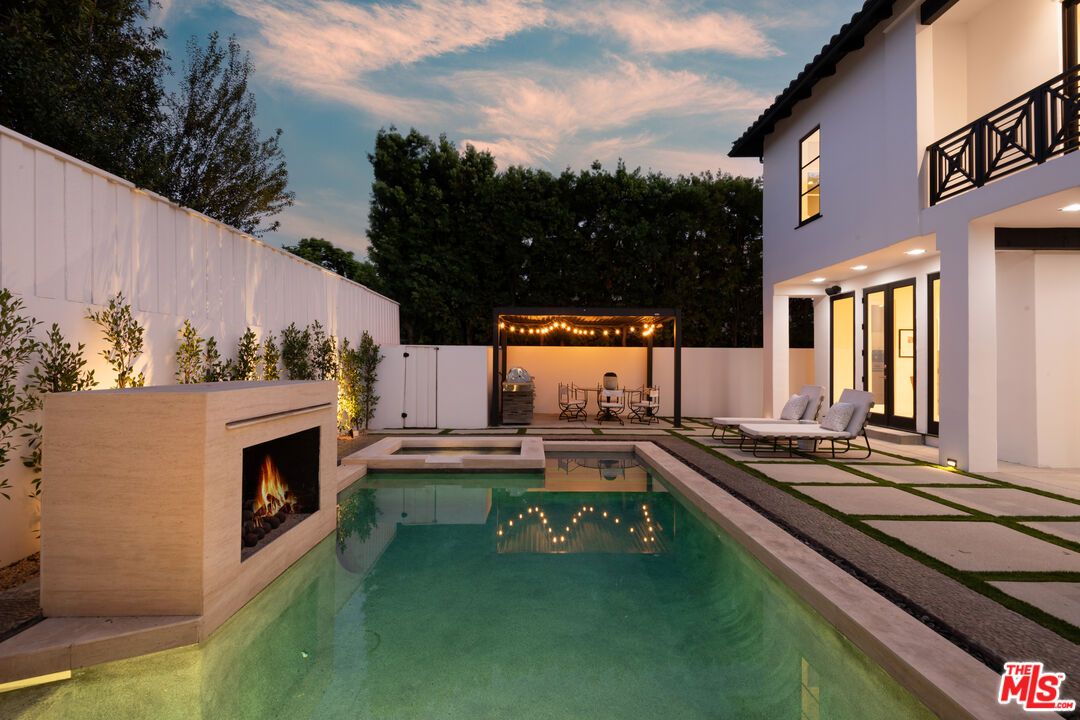 Exterior, Fireplace, Pool