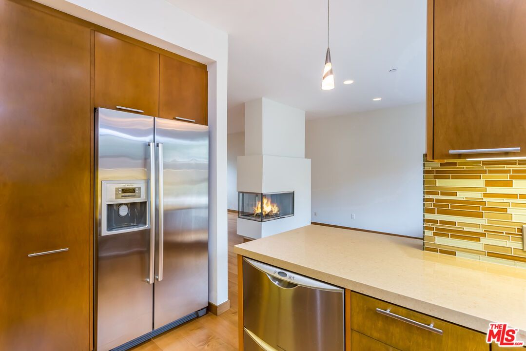 Fireplace, Interior, Kitchen, Pendant Lights, Recessed Lighting, Stainless Steel Appliances, Wood Texture Flooring