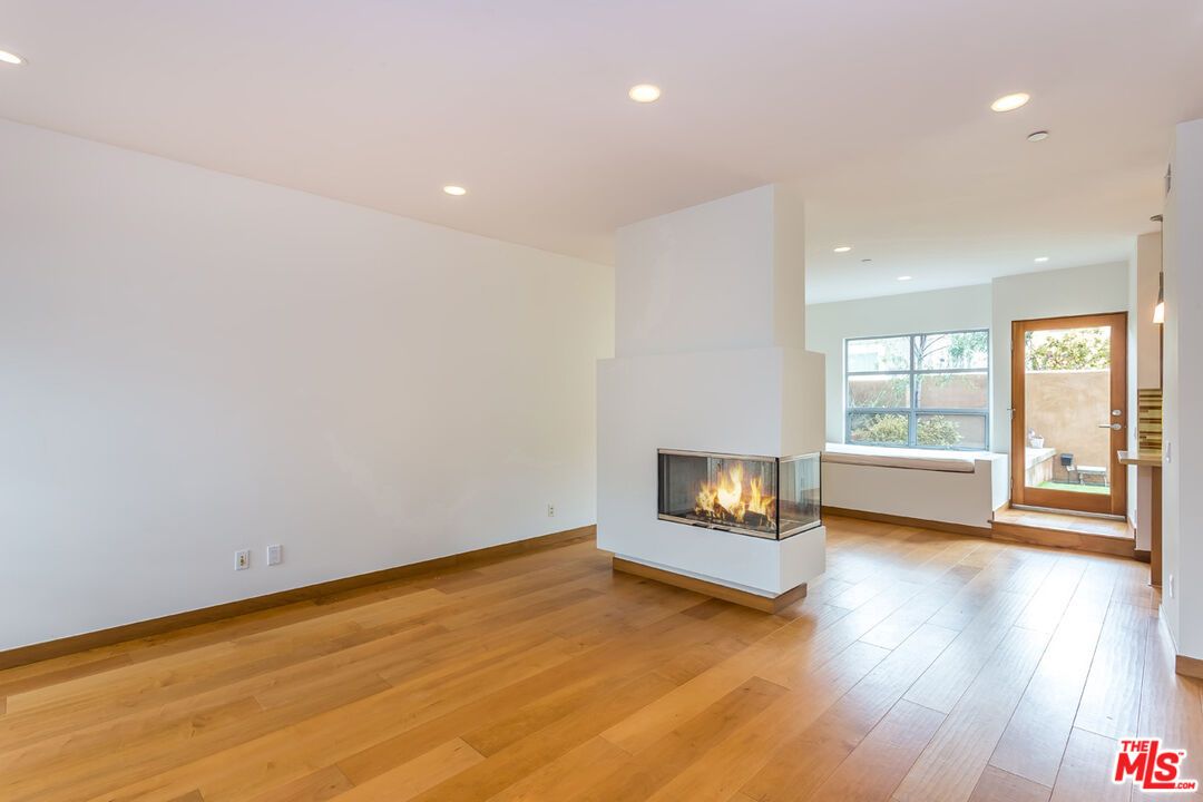 Empty room, Fireplace, Interior, Recessed Lighting, Wood Texture Flooring