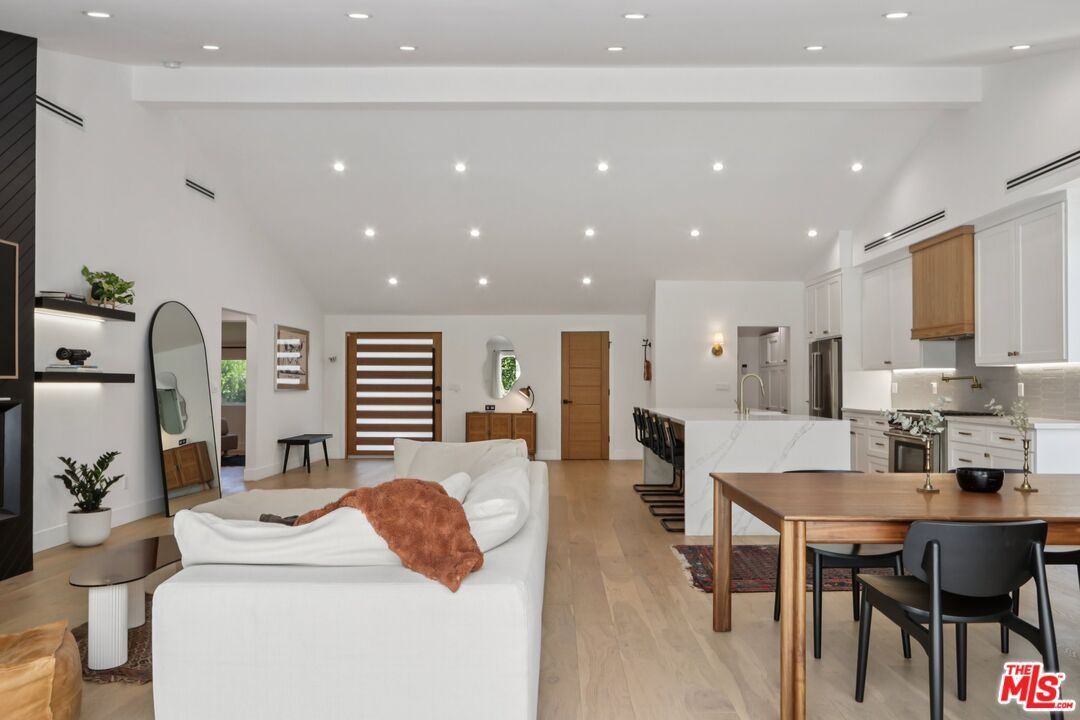 Dining room, Interior, Kitchen, Living room, Recessed Lighting, Stainless Steel Appliances, Wood Texture Flooring