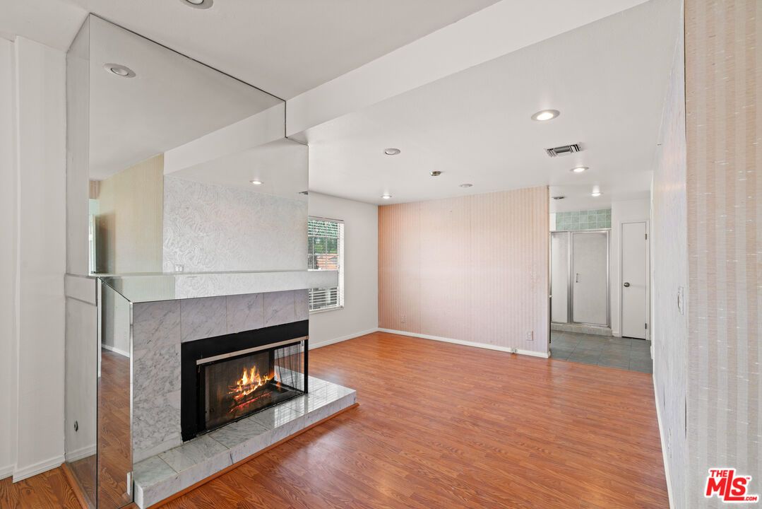 Empty room, Fireplace, Interior, Recessed Lighting, Wood Texture Flooring