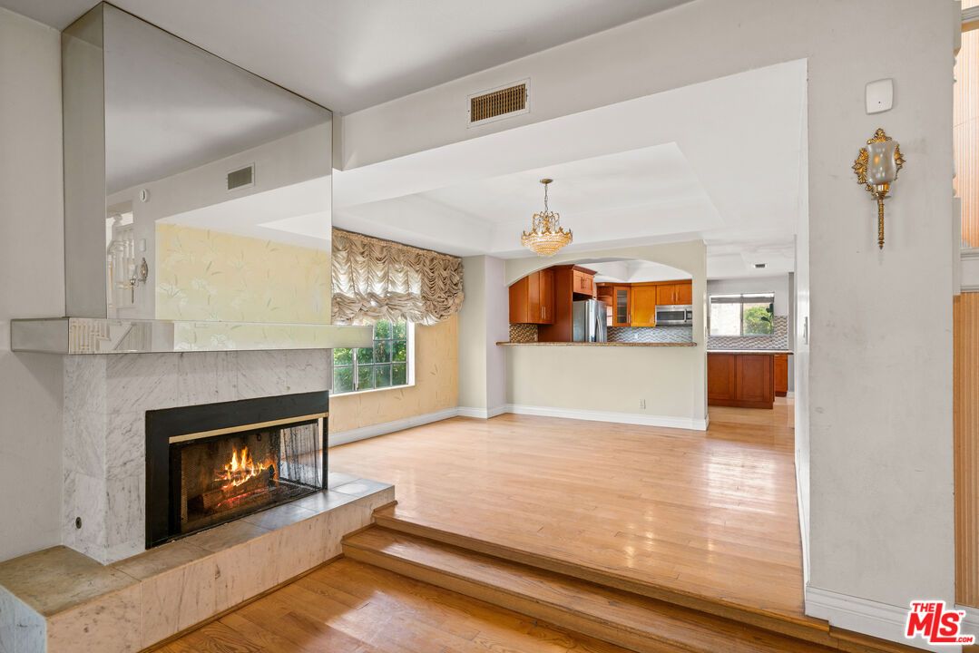 Chandelier, Empty room, Fireplace, Interior, Pendant Lights, Wood Texture Flooring