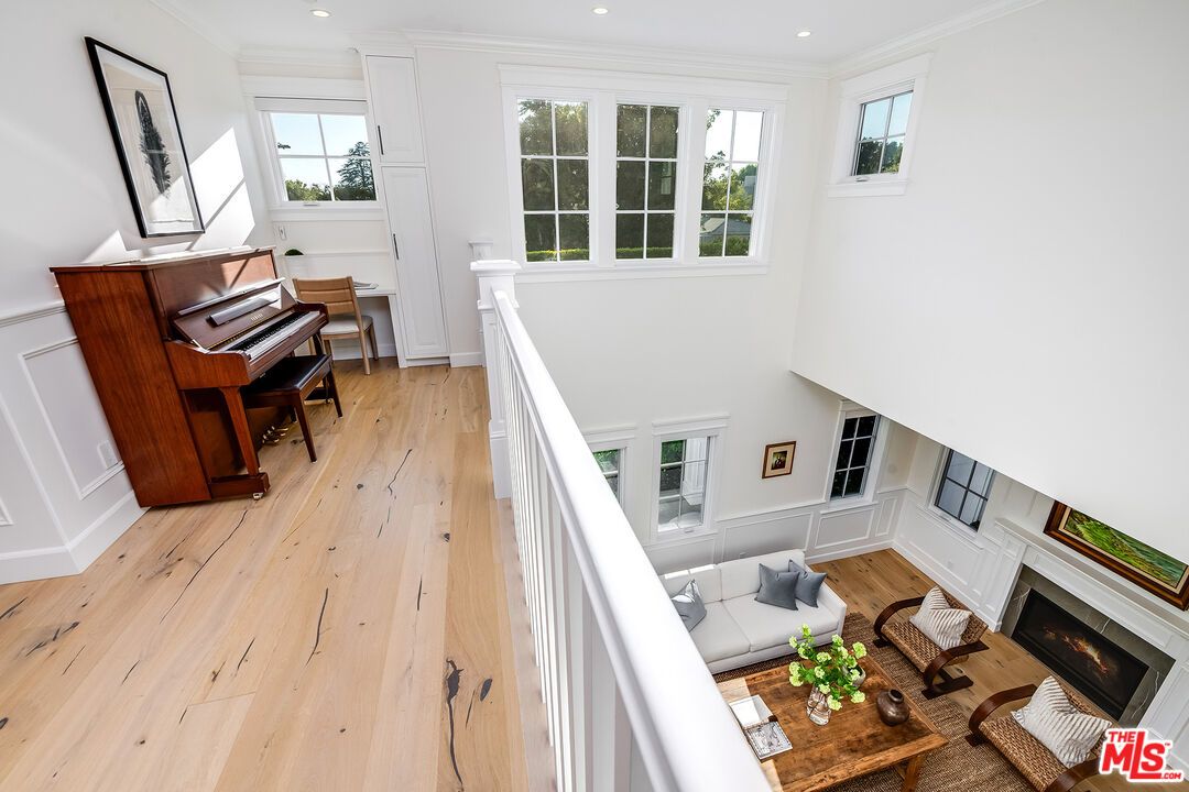 Fireplace, Interior, Living room, Piano, Recessed Lighting, Wood Texture Flooring