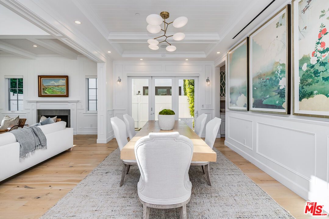 Dining room, Fireplace, Interior, Living room, Pendant Lights, Recessed Lighting, Wood Texture Flooring