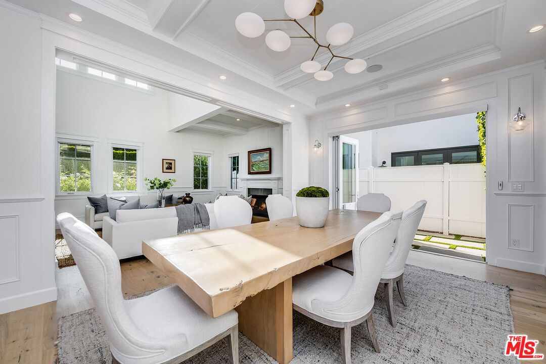 Dining room, Fireplace, Interior, Living room, Pendant Lights, Recessed Lighting, Wood Texture Flooring