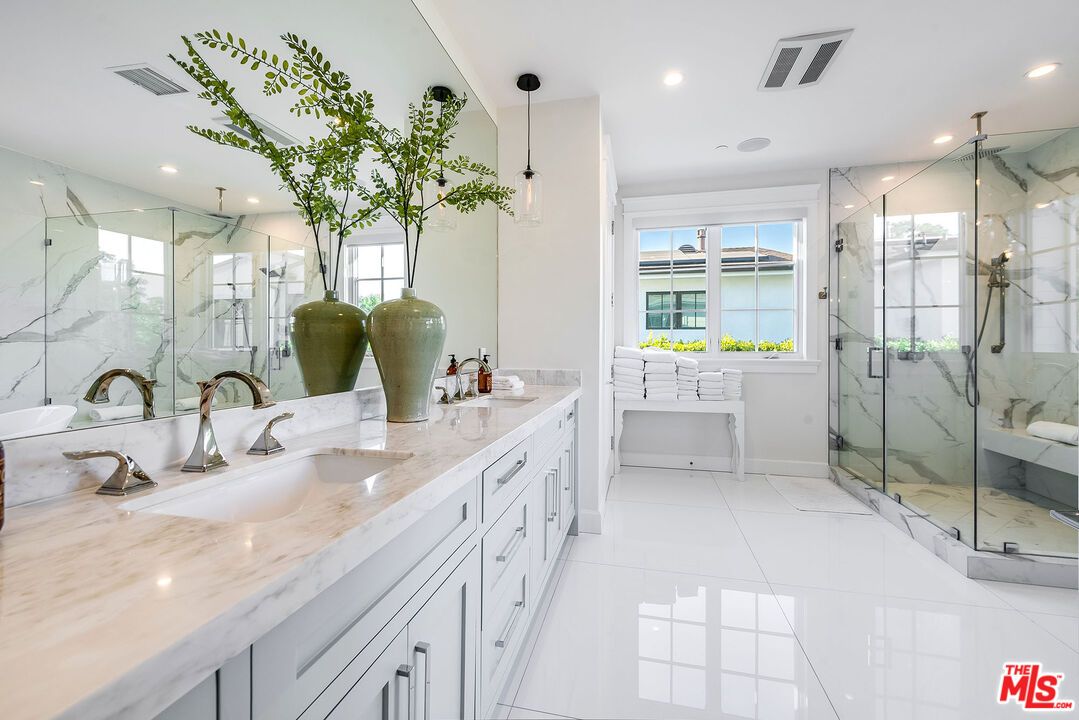 Bathroom, Dual Sink Vanities, Glass Shower, Interior, Marble Walls, Pendant Lights, Recessed Lighting