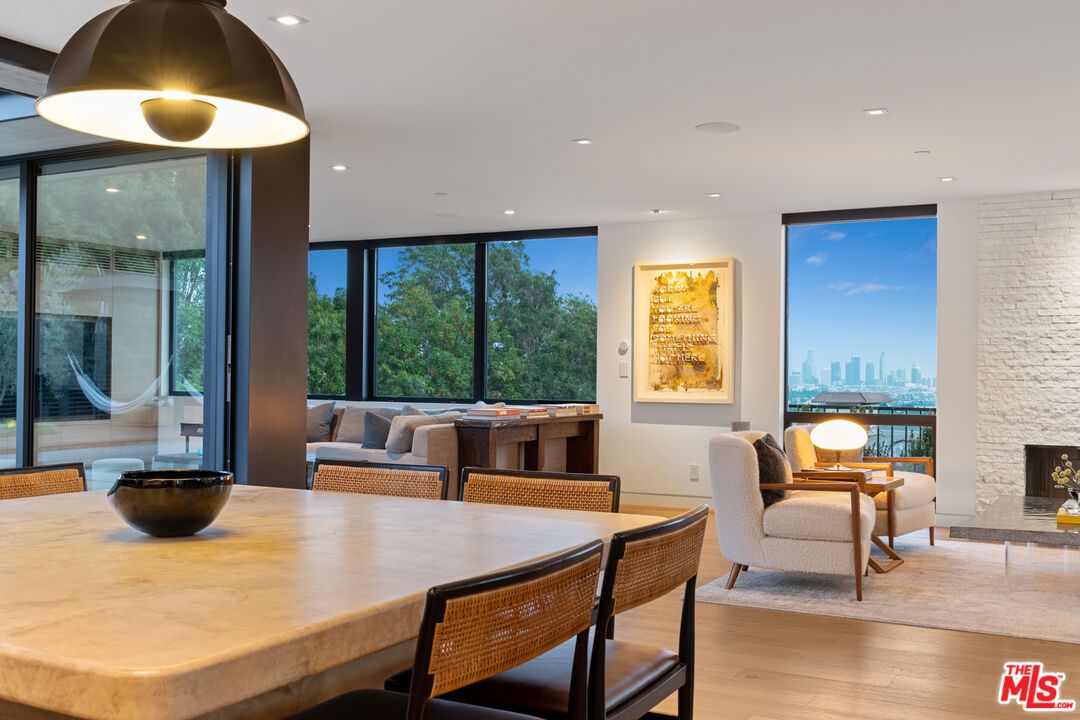 Dining room, Fireplace, Interior, Recessed Lighting, Stone Walls, Wood Texture Flooring