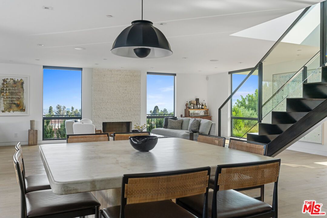 Dining room, Fireplace, Interior, Pendant Lights, Recessed Lighting, Wood Texture Flooring