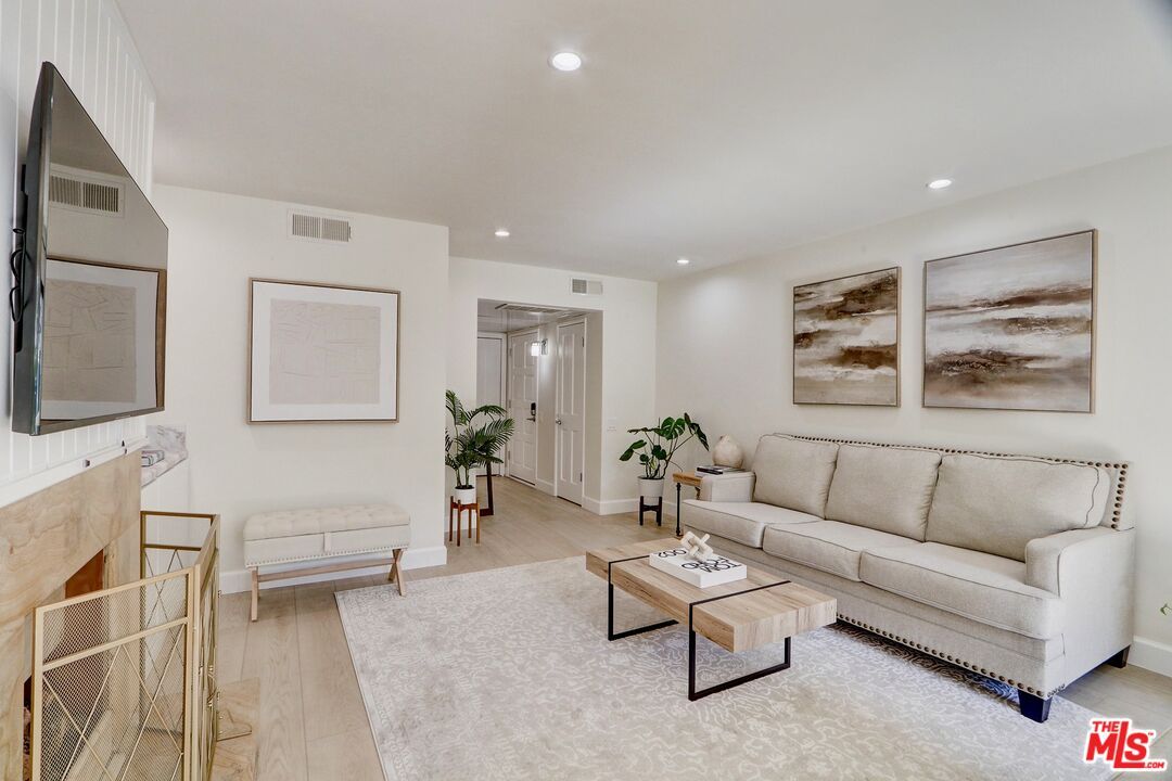 Fireplace, Interior, Living room, Recessed Lighting, Wood Texture Flooring