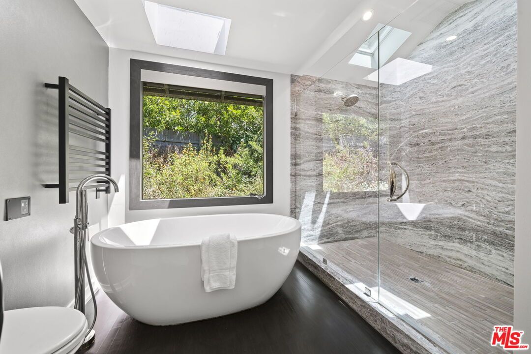 Bathroom, Free Standing Baths, Glass Shower, Interior, Recessed Lighting, Wood Texture Flooring