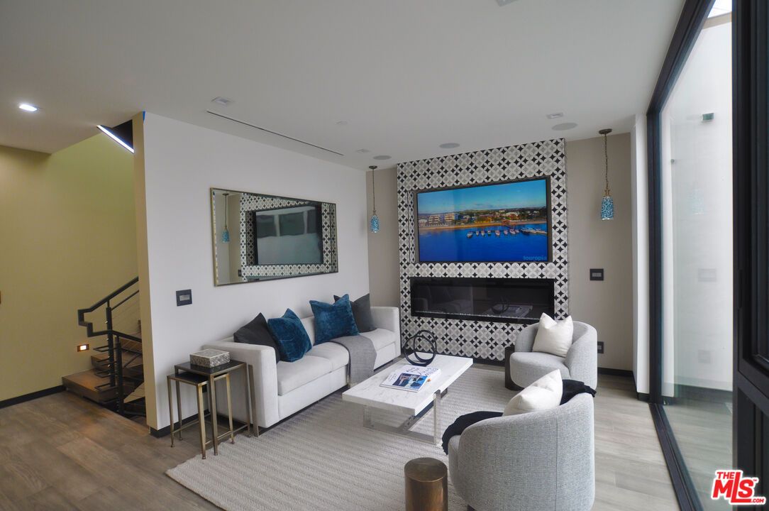 Fireplace, Interior, Living room, Recessed Lighting, Wood Texture Flooring