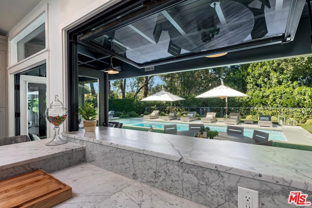Exterior, Marble, Pendant Lights, Pool