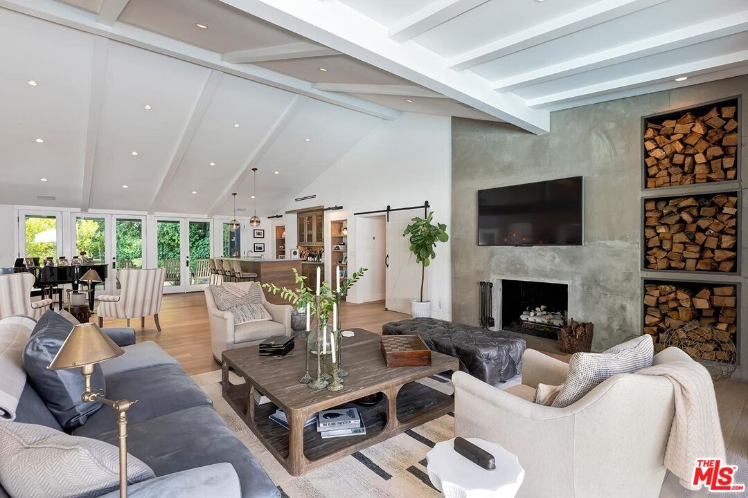 Dining room, Fireplace, Interior, Living room, Pendant Lights, Recessed Lighting, Stone Walls, Wood Texture Flooring