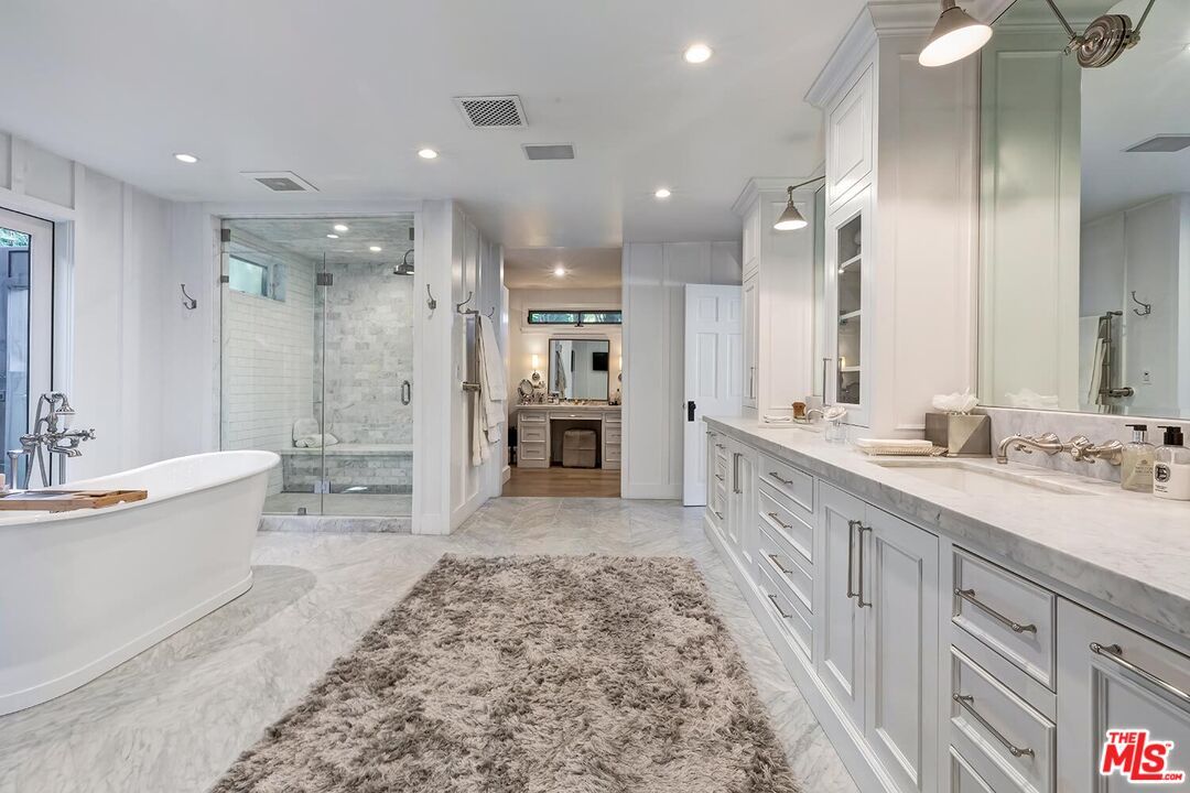Bathroom, Dual Sink Vanities, Free Standing Baths, Glass Shower, Interior, Marble, Marble Walls, Recessed Lighting