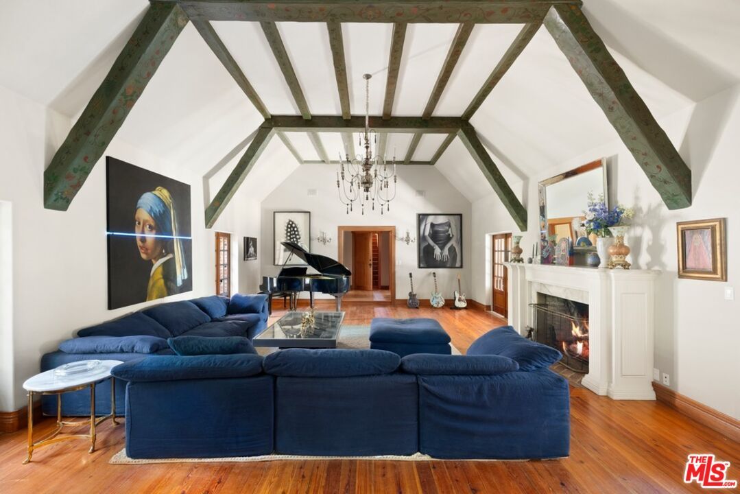 Chandelier, Fireplace, Interior, Living room, Pendant Lights, Piano, Wooden Beams, Wood Texture Flooring