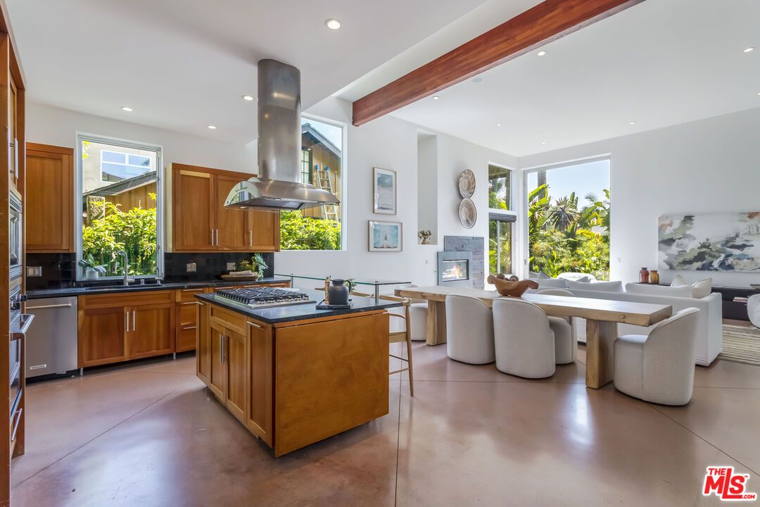 Dining room, Fireplace, Interior, Kitchen, Recessed Lighting, Stainless Steel Appliances, Wooden Beams