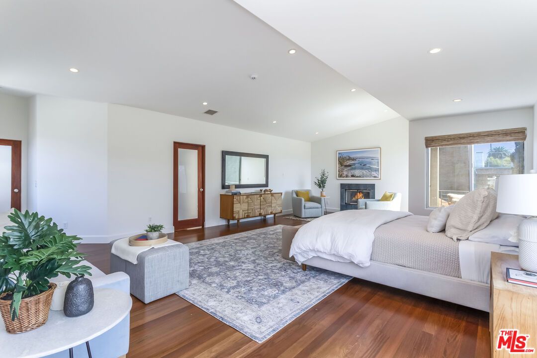 Bedroom, Fireplace, Interior, Recessed Lighting, Wood Texture Flooring
