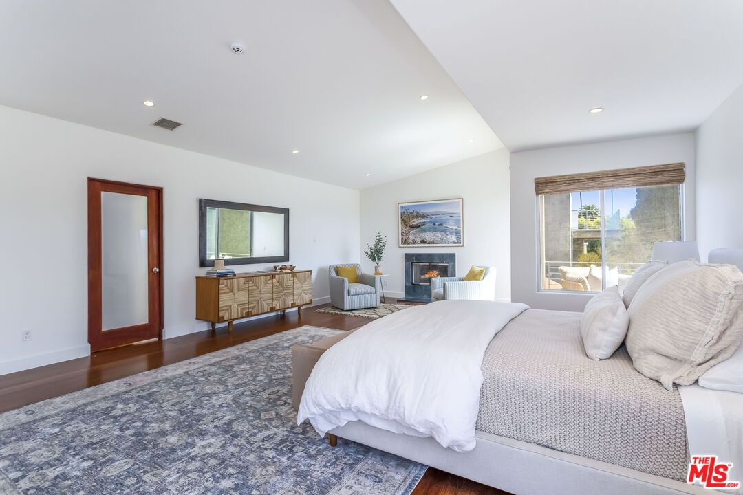 Bedroom, Fireplace, Interior, Recessed Lighting, Wood Texture Flooring