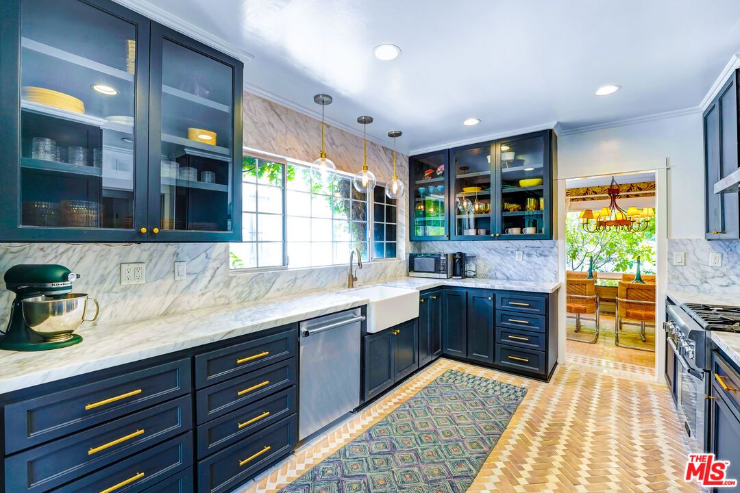 Interior, Kitchen, Marble Walls, Pendant Lights, Recessed Lighting, Stainless Steel Appliances
