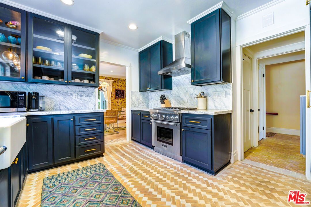 Interior, Kitchen, Marble Walls, Recessed Lighting, Stainless Steel Appliances