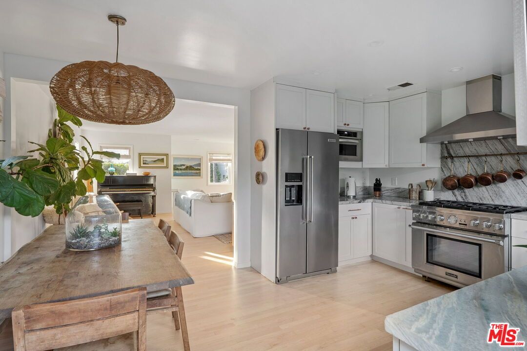 Dining room, Interior, Kitchen, Living room, Pendant Lights, Piano, Stainless Steel Appliances, Wood Texture Flooring