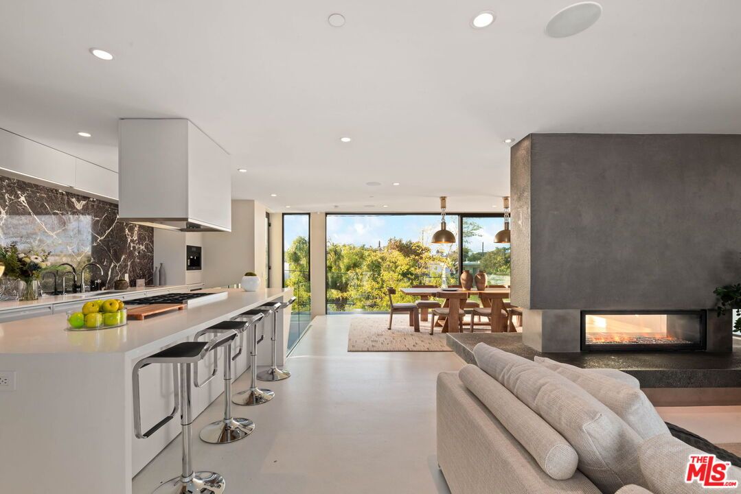 Dining room, Fireplace, Interior, Kitchen, Marble Walls, Pendant Lights, Recessed Lighting