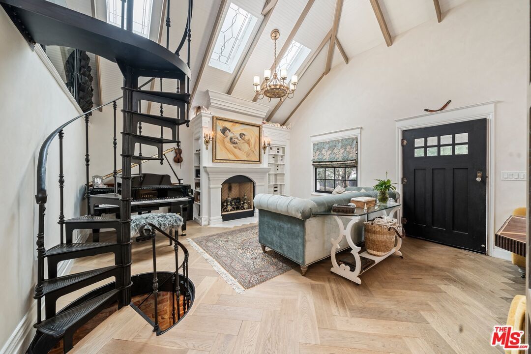 Chandelier, Fireplace, Interior, Living room, Piano, Wood Texture Flooring