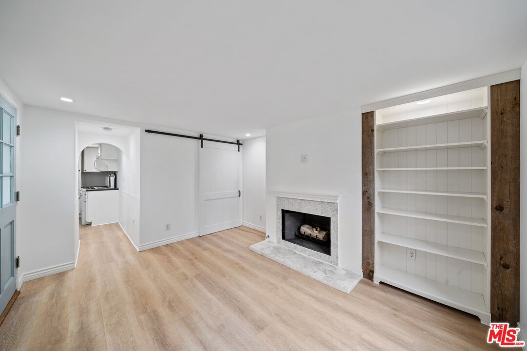 Empty room, Fireplace, Interior, Recessed Lighting, Wood Texture Flooring