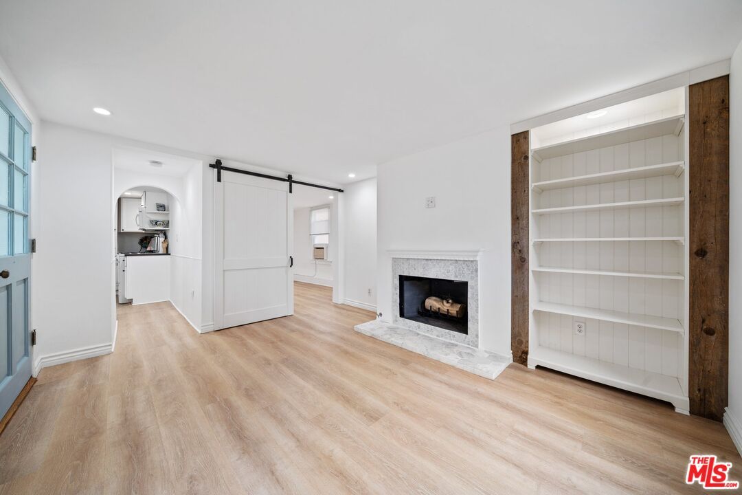 Empty room, Fireplace, Interior, Recessed Lighting, Wood Texture Flooring