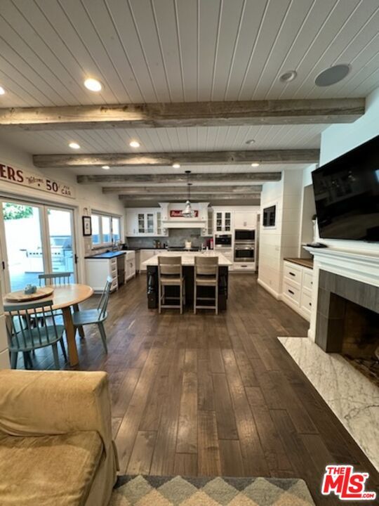 Dining room, Fireplace, Interior, Kitchen, Pendant Lights, Recessed Lighting, Stainless Steel Appliances, Wooden Beams, Wooden Ceilings, Wood Texture Flooring