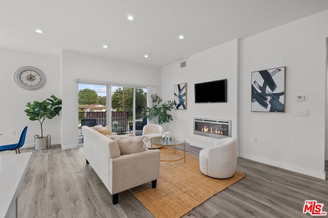 Fireplace, Interior, Living room, Recessed Lighting, Wood Texture Flooring