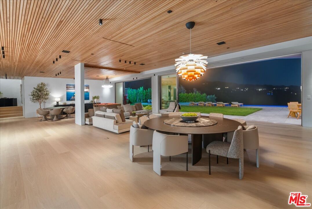 Chandelier, Dining room, Interior, Living room, Pendant Lights, Recessed Lighting, Wooden Ceilings, Wood Texture Flooring